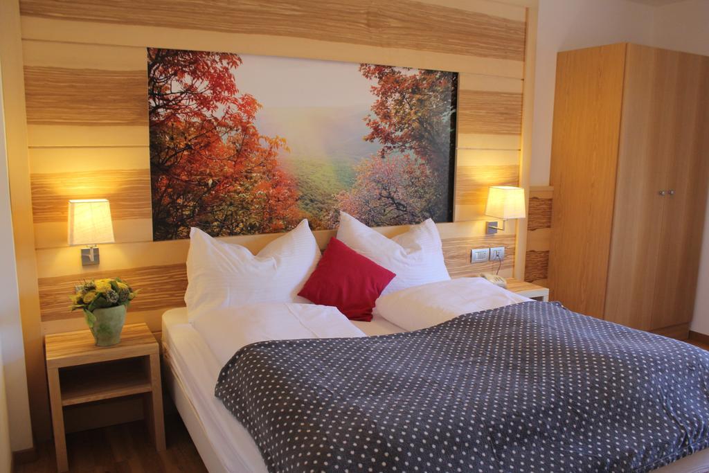 Hotel Pineta Baselga di Pinè Pokoj fotografie
